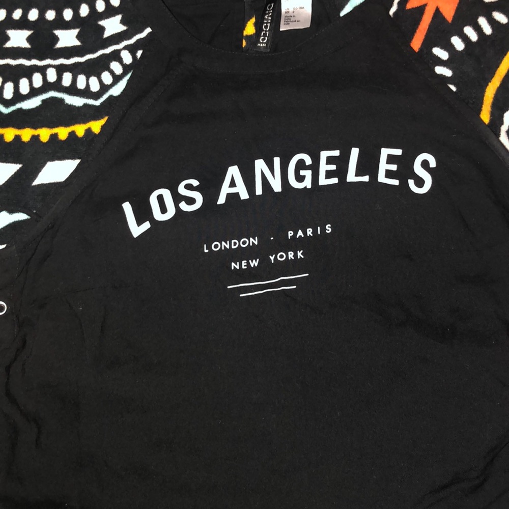 A black muscle tee that ties on the sides
